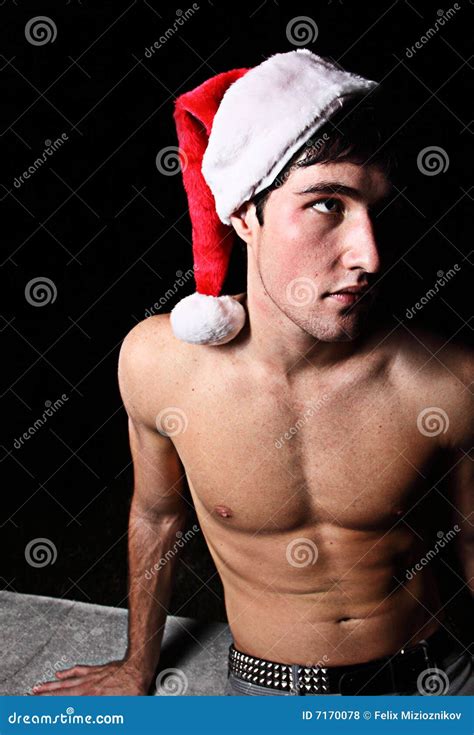 Man Wearing A Santa Hat Stock Photo Image Of Teenager 7170078