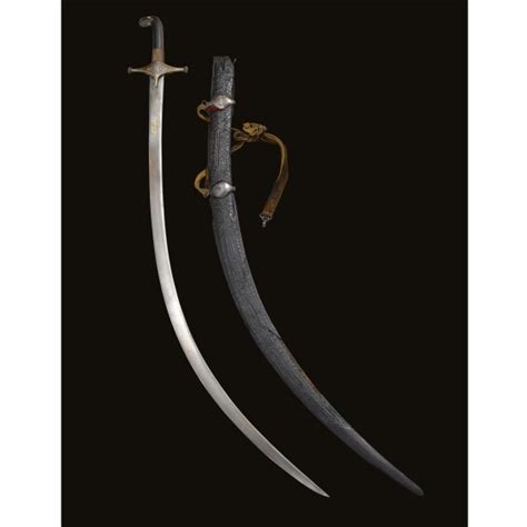 150 a sword shamshir with watered steel blade signed asadullah 17th century with scabbard