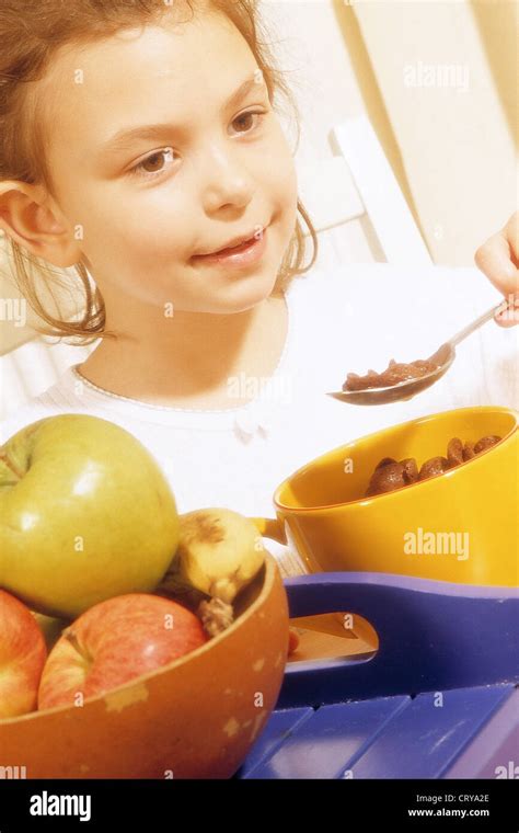 Child Eating Breakfast Stock Photo Alamy