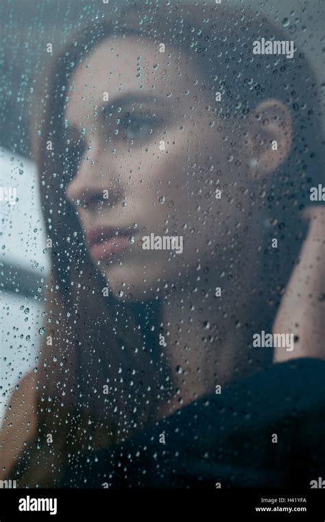 Woman Looking Through Window Rain Hi Res Stock Photography And Images