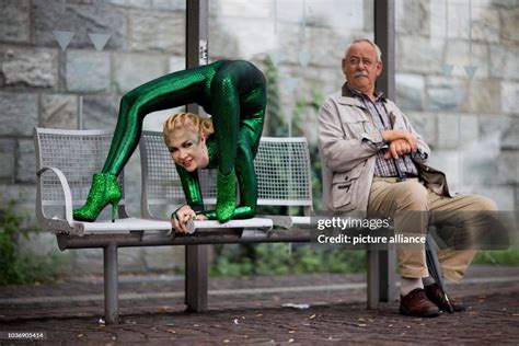 contortionist zlata poses at a bus stop during a photo shooting in news photo getty images