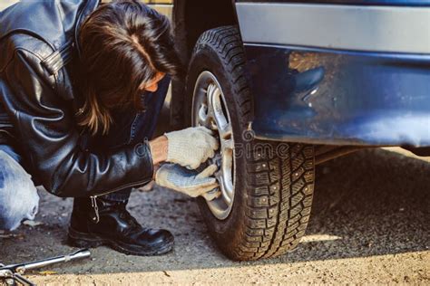 Man Changing Wheel On A Car Stock Photo Image Of Maintenance Mechanic