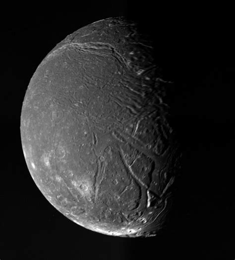 Titania Moon Of Uranus Is Photographed By The Voyager 2 Space Probe