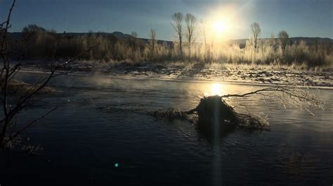 Sun Reflects Cold River Frozen Winter Nature Landscape 