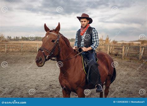 Cowboy Riding A Horse In Desert Valley Western Stock Image Image Of