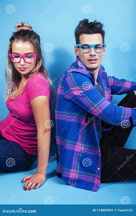 Happy Couple Together Posing Cheerful On Blue Background Wearing