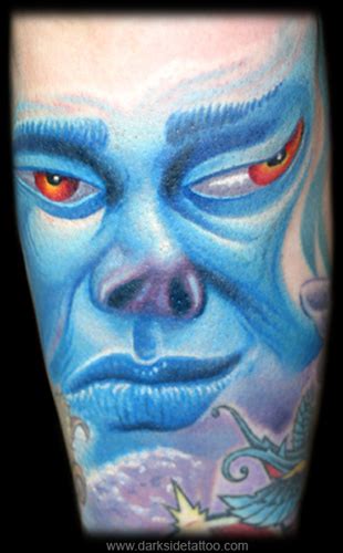 Tattoo Galleries Melting Face Tattoo Design