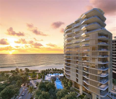 An Artists Rendering Of A High Rise Building Next To The Ocean At Sunset
