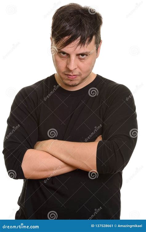 Studio Shot Of Angry Caucasian Man With Arms Crossed Stock Image