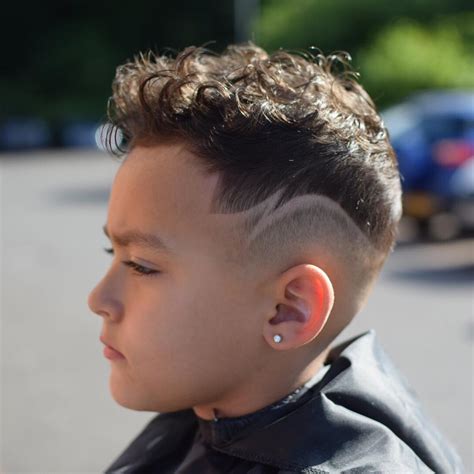 In fact, long curly hair is now so popular for men that many men. Boys Haircuts Latest Boys Fade Haircuts 2019 - Men's ...