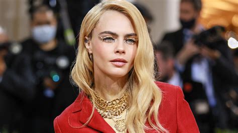 A Gold Painted Cara Delevingne Walked The 2022 Met Gala Red Carpet