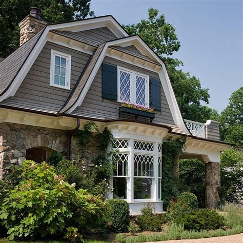 Classical Tudor Style Windows Add Bearing To This Dutch Colonial