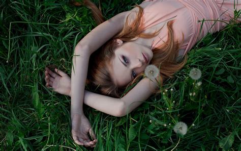 Woman Laying On Bed Of Dandelion Hd Wallpaper Wallpaper Flare