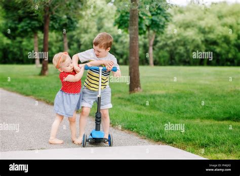Two Little Caucasian Preschool Children Fighting Hitting Each Other