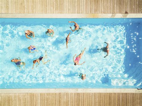 Top View Of Group Of Seniors In Swimming Pool Stock Photo