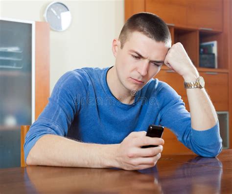 Sad Guy Crying After Phone Call In His Home Stock Photo Image Of