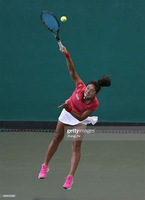 Yafan Wang Of China Serves During Her Match Against Samantha Stosur