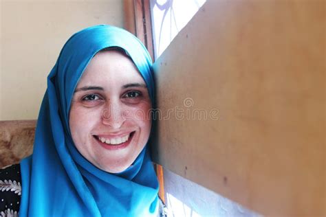 Smiling Arab Muslim Woman With Mobile And Headset Stock Image Image