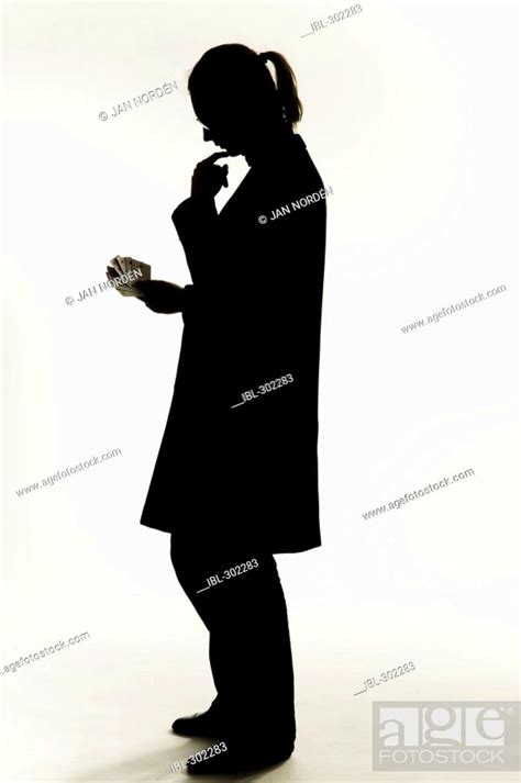 Silhouette Of A Thinking Woman Stock Photo Picture And Rights Managed