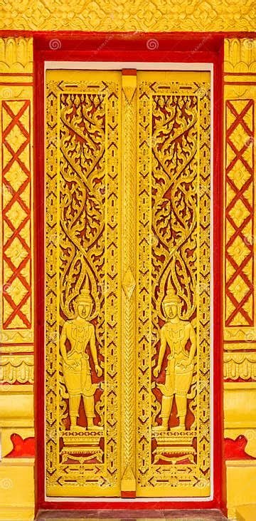 Vintage Deity Design On Ancient Carved Wooden Temple Doors Stock Photo