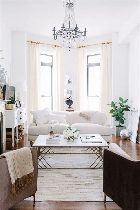 Timeless Silhouettes Inside This Bright White Apartment Living Room