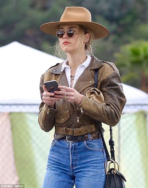 Amber Heard Poses With Crutches After Sustaining A Broken Bone Daily Mail Online