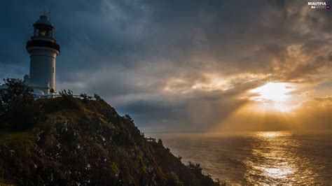 Coast Lighthouse Rays Sun Clouds Maritime Beautiful Views