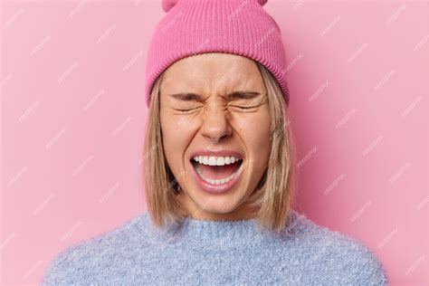 Premium Photo Headshot Of Emotional Irritated Woman Screams Loudly