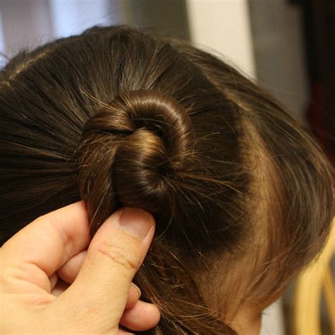 Traditional Chinese Childrens Hairstyle Two Buns On The Sides