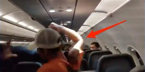 video shows a frontier passenger being duct taped to his seat after punching and groping flight