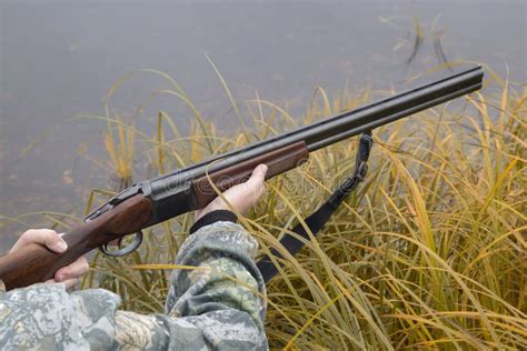 Hunter With A Gun Autumn Duck Hunting Stock Photo Image Of Camou