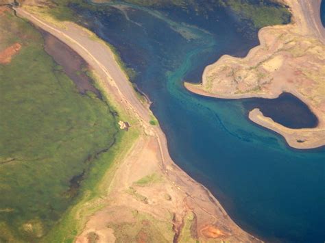Aerial Shots Of A Turquoise River In Iceland Albatz Travel Adventures
