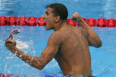 tunisian teen wins surprise olympic swimming gold newsworthy news global political local new site