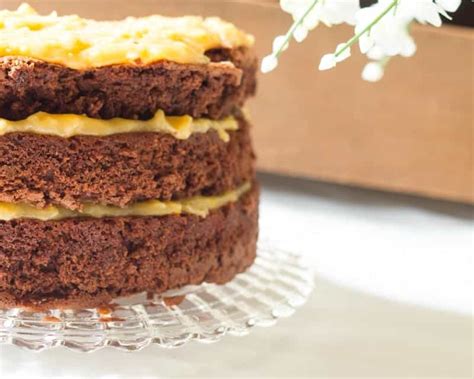 Homemade german chocolate cake with layers of coconut pecan frosting and chocolate frosting. How to Make the Best German Chocolate Cake from Scratch ...