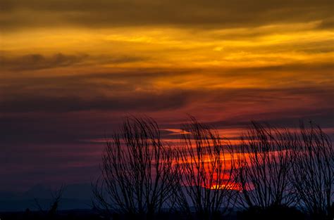 Smoky Sky Sunset Photograph By Bob Juarez Fine Art America