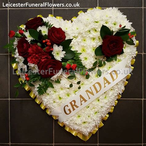 The common name bleeding heart derives from the unusual heart shape of the flowers. HEART Floral Tribute 21 inch - Funeral Flowers Leicester