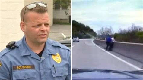 Police Officer Tackles Suicidal Man Right Before He Tries To Leap Off