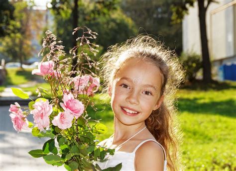 Cute Little Girl Hold Roses Smile Summer Day Outdoors Stock Photos