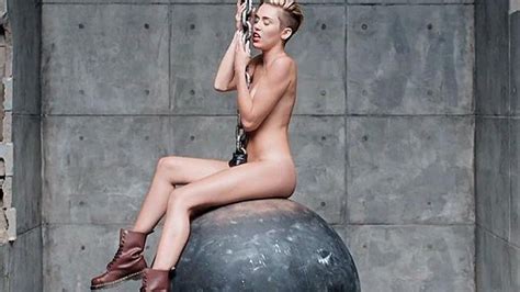 Miley Cyrus Appears Naked Crying In Wrecking Ball Video Upi Com