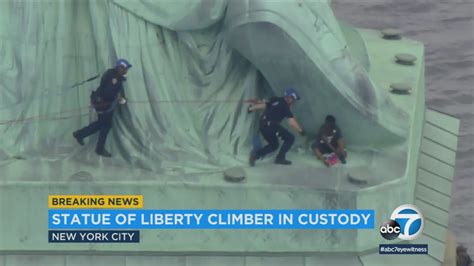 Woman Climbs Statue Of Liberty Liberty Island Evacuated Abc7 Chicago