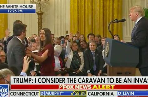 Jim Acosta Physically Grabs Microphone Away From Female Staffer