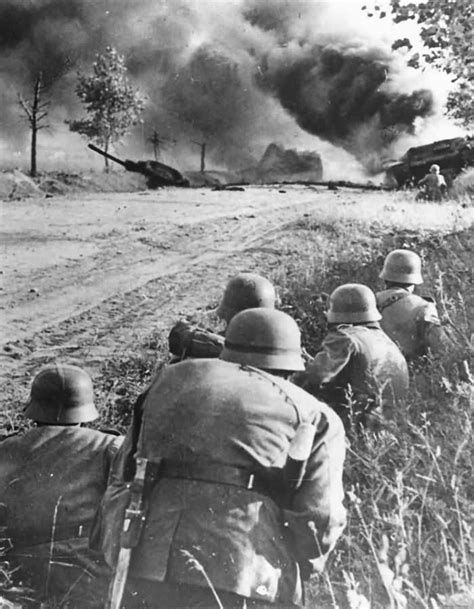 German Soldiers And Burning Soviet Tank On Eastern Front 1941 World