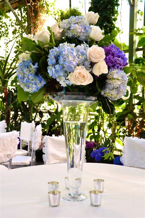 tall centerpiece with blue hydrangea and vendella roses white hydrangea centerpieces flower