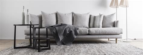 Indian buffalo leather in striking black has been draped over. Designer Sofas Sydney & Melbourne - Fanuli Furniture