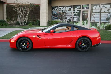 It is no secret that ferrari will make the california the first turbocharged prancing horse since the legendary f40, but now more… Red Ferrari - Car Wraps - 800WrapMyCar