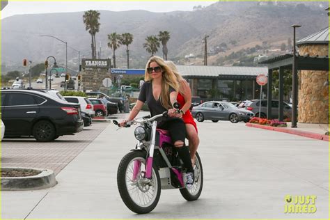 Avril Lavigne Rides A Hot Pink Motorcycle During Memorial Day Holiday