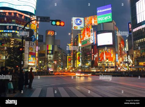 Neon Lights Of Shibuya At Dusk Tokyo Honshu Japan Asia Stock Photo
