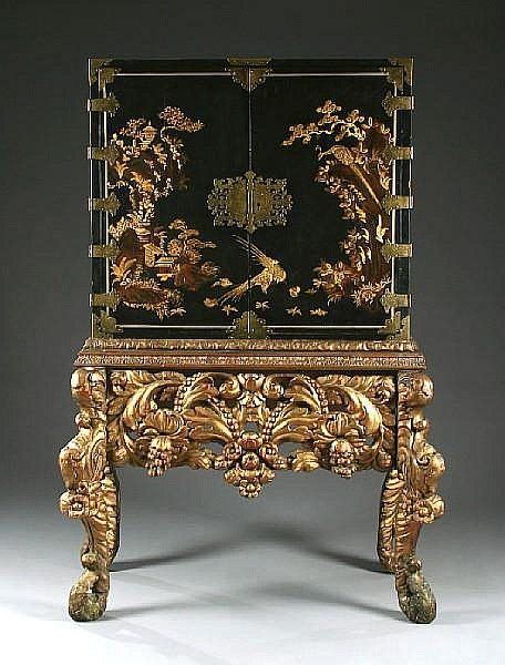 A Black Japanned And Gilt Decorated Collectors Cabinet On An Asian