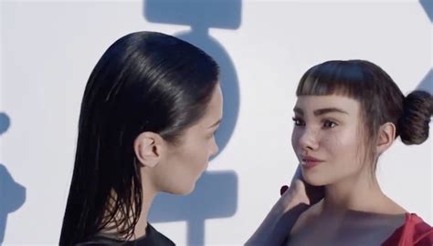Calvin Klein Apologizes For Having Bella Hadid Make Out With A Female Robot Chicks On The Right