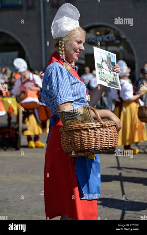 Girl In Traditional Dutch Costume At The Cheese Market Waagplein Stock